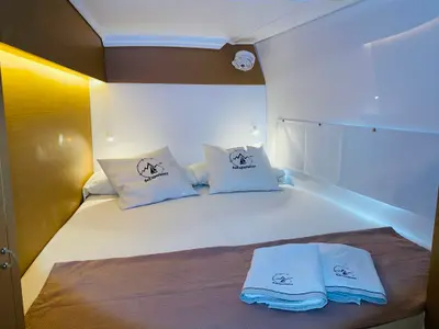 Cabin on ONE Mallorca BAREBOAT, a Excess 11 catamaran at Port d'Andratx, Spain