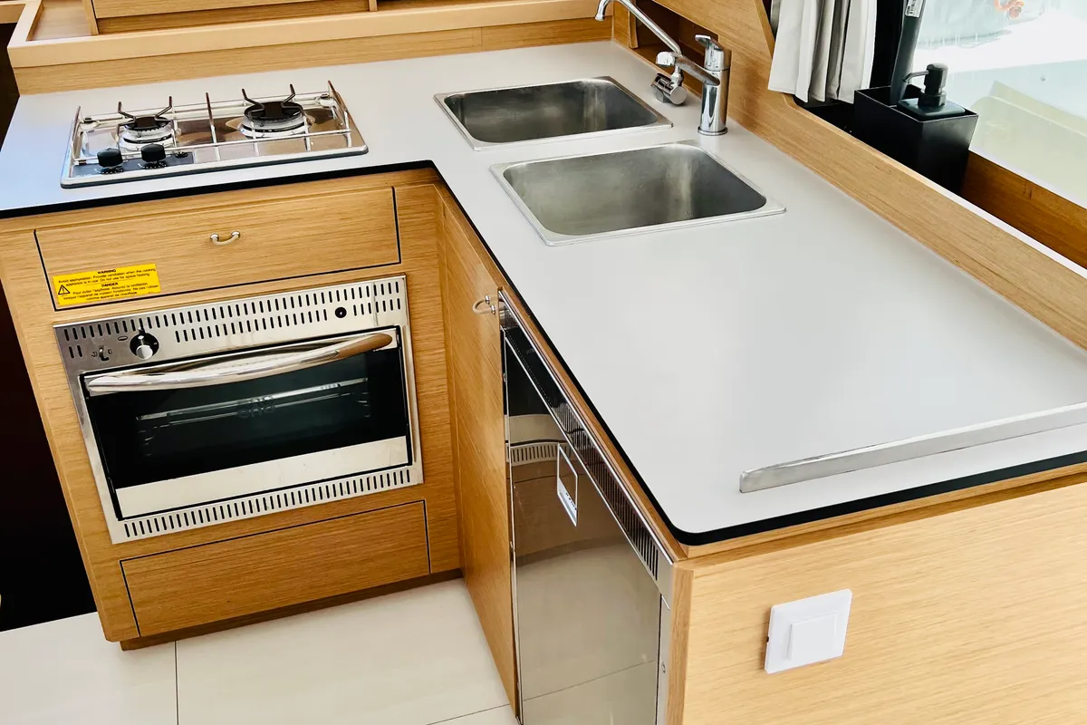 Galley of ONE Mallorca BAREBOAT, a Excess 11 catamaran at Port d'Andratx, Spain