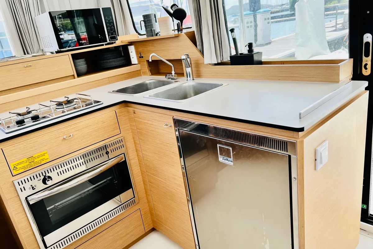 Galley of ONE Mallorca BAREBOAT, a Excess 11 catamaran at Port d'Andratx, Spain