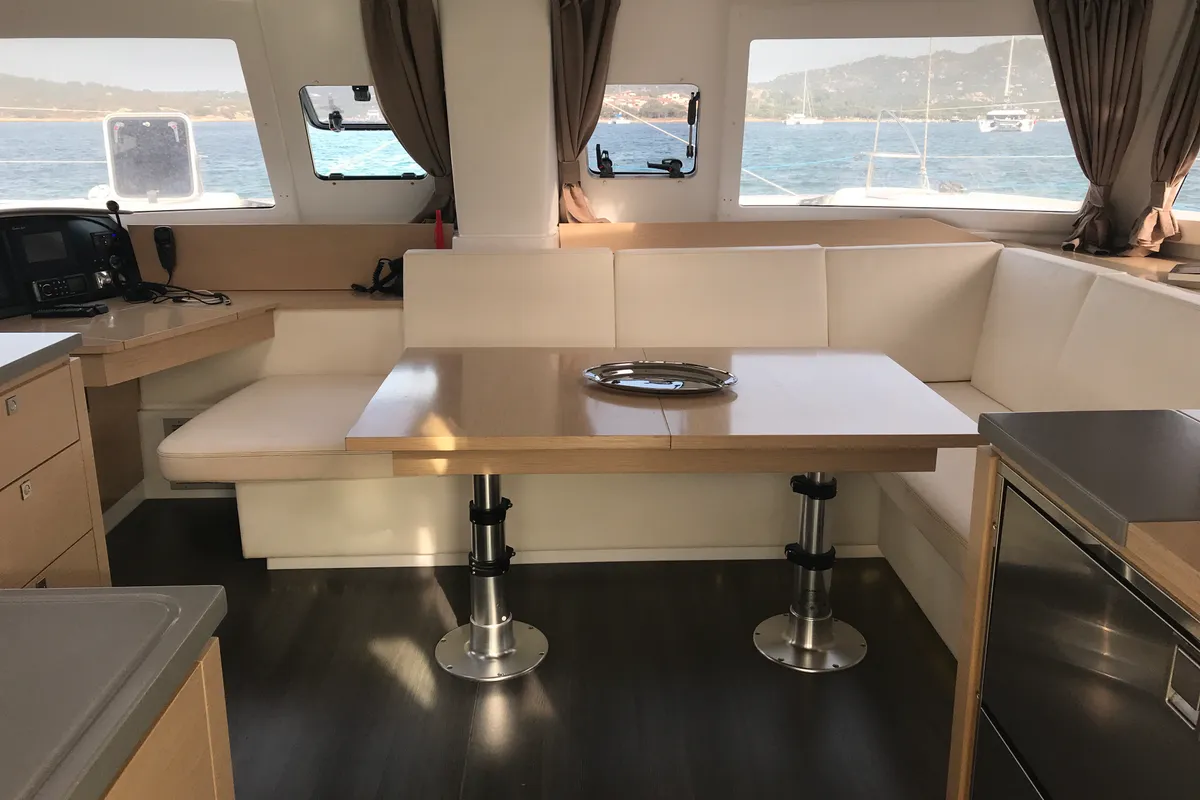 Salon of Pixie Dixie, a Fountaine Pajot Helia 44 catamaran at Olbia, Italy