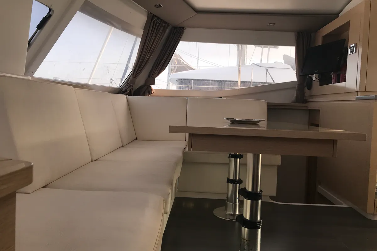 Salon of Pixie Dixie, a Fountaine Pajot Helia 44 catamaran at Olbia, Italy