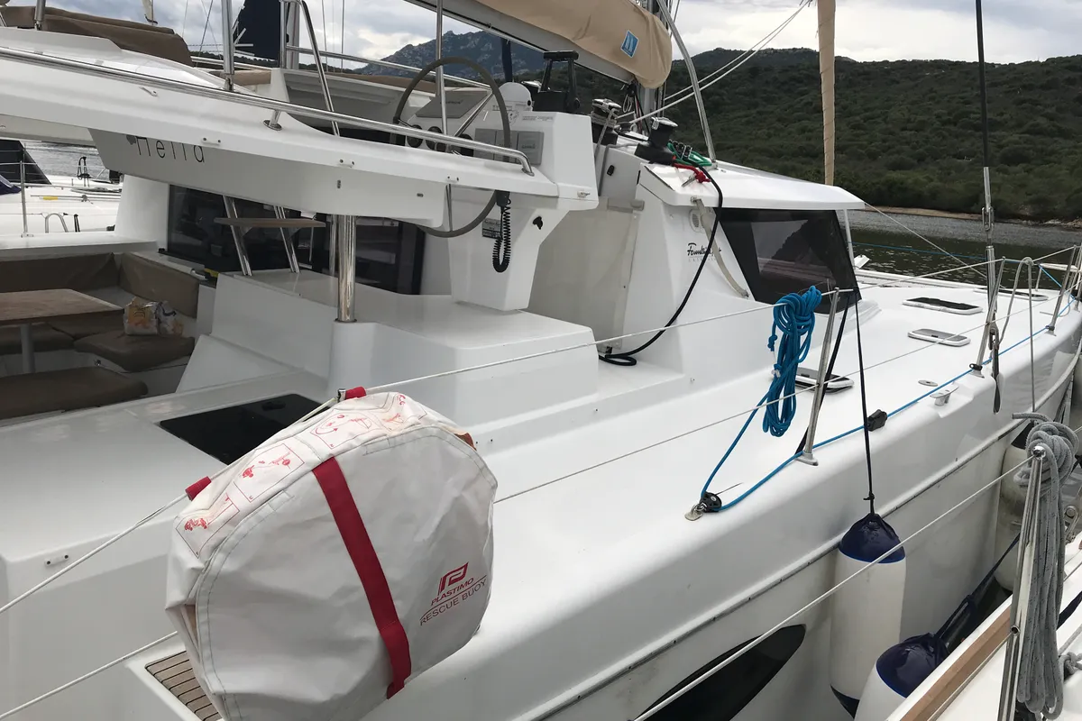 Exterior view of Pixie Dixie, a Fountaine Pajot Helia 44 catamaran at Olbia, Italy