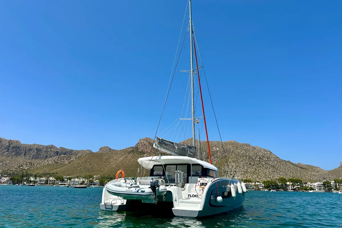 Exterior view of Floki, a Excess 11 catamaran at Port de Pollença, Spain