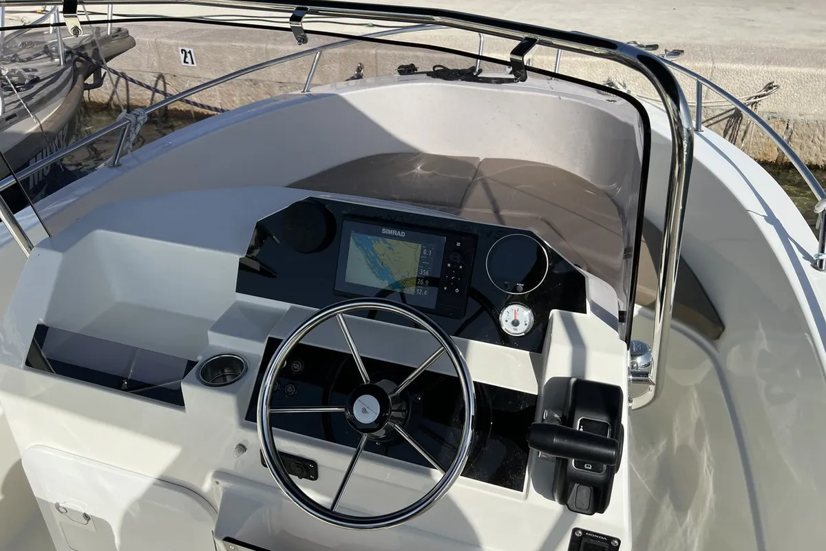 Cockpit of Atlantic Marine 530 - beige, a Atlantic Marine 530 motorboat at Pirovac, Croatia