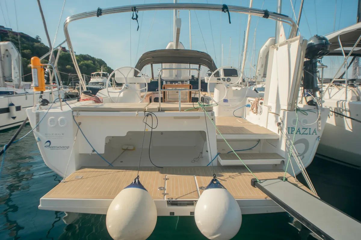 Exterior view of Ipazia, a Dufour 56 Exclusive sailboat at Olbia, Italy