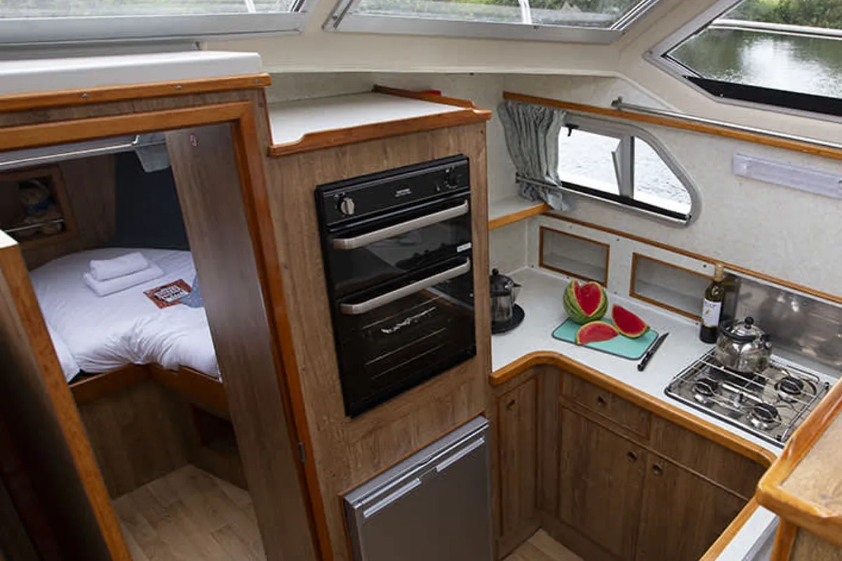 Galley of Cygnet Crusader, a motorboat at Le Mas-d'Agenais, France