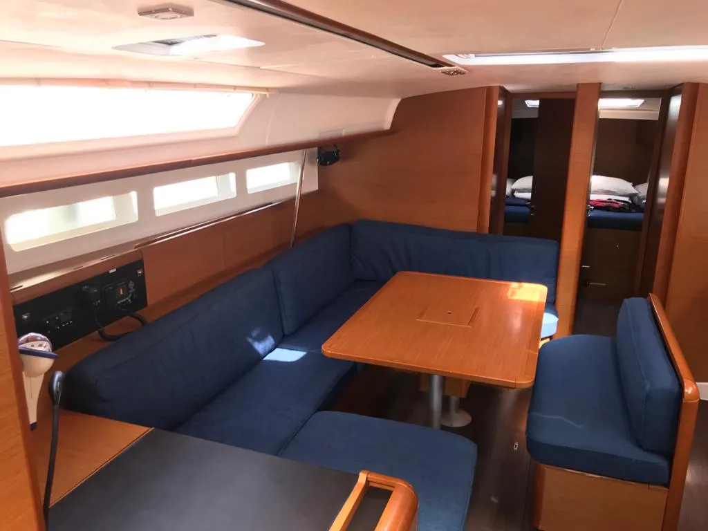 Salon of Alboran Prosecco (Radazul), a Jeanneau Sun Odyssey 519 sailboat at El Rosario, Spain