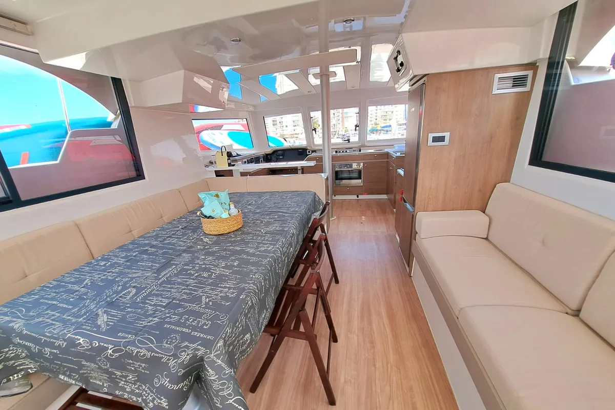 Salon of La Boheme, a Bali Catspace catamaran at Sant Antoni de Portmany, Spain