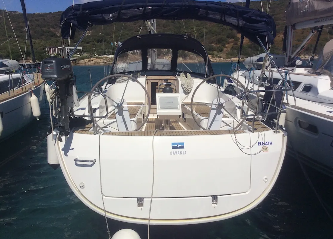 Exterior view of Elnath, a Bavaria Cruiser 37 sailboat at Olbia, Italy