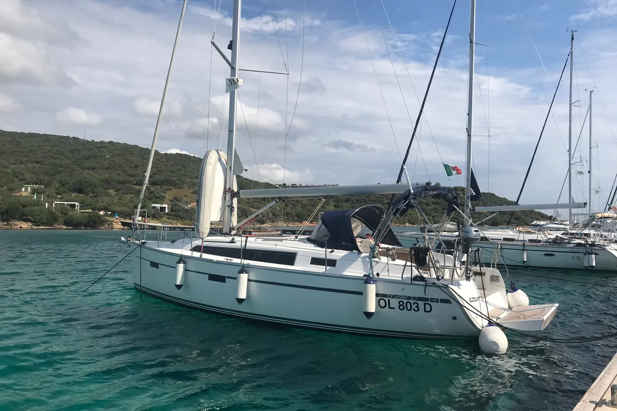 Exterior view of Elnath, a Bavaria Cruiser 37 sailboat at Olbia, Italy