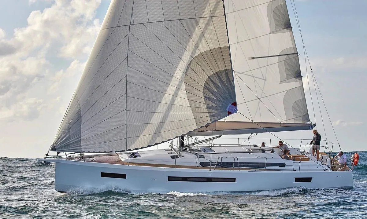 Exterior view of Mad Kiss, a Jeanneau Sun Odyssey 490 sailboat at Lavreotiki Municipal Unit, Greece