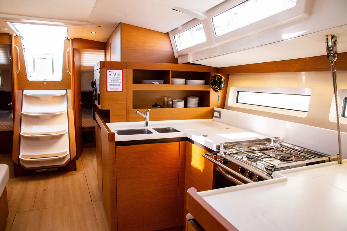 Mad Kiss, a Jeanneau Sun Odyssey 490 sailboat at Lavreotiki Municipal Unit, Greece