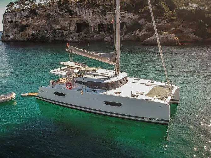 Exterior view of Aurora 381, a Fountaine Pajot Saona 47 catamaran at es Jonquet, Spain