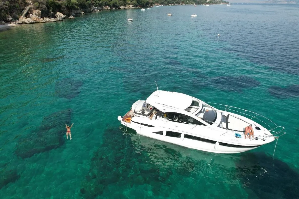 Exterior view of Sandy I, a Bavaria SR41 motor yacht at Kontokali, Greece