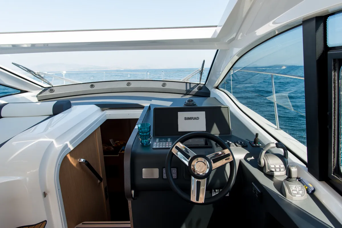 Cockpit of Sandy I, a Bavaria SR41 motor yacht at Kontokali, Greece
