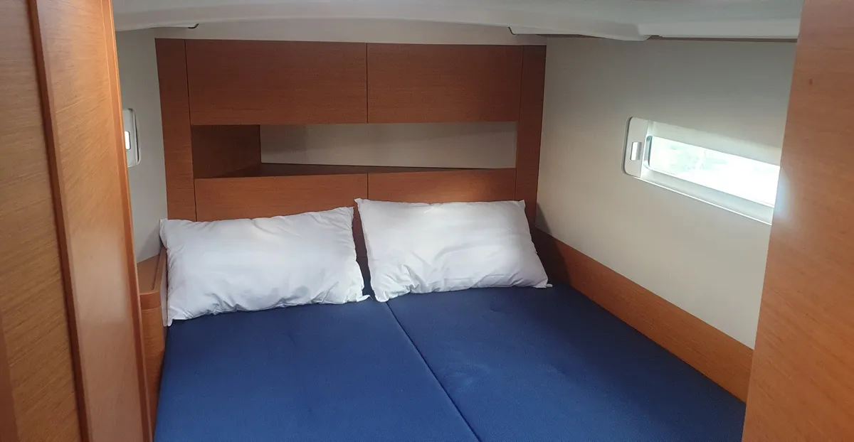 Cabin on The song is you, a Jeanneau Sun Odyssey 410 sailboat at Tropea, Italy