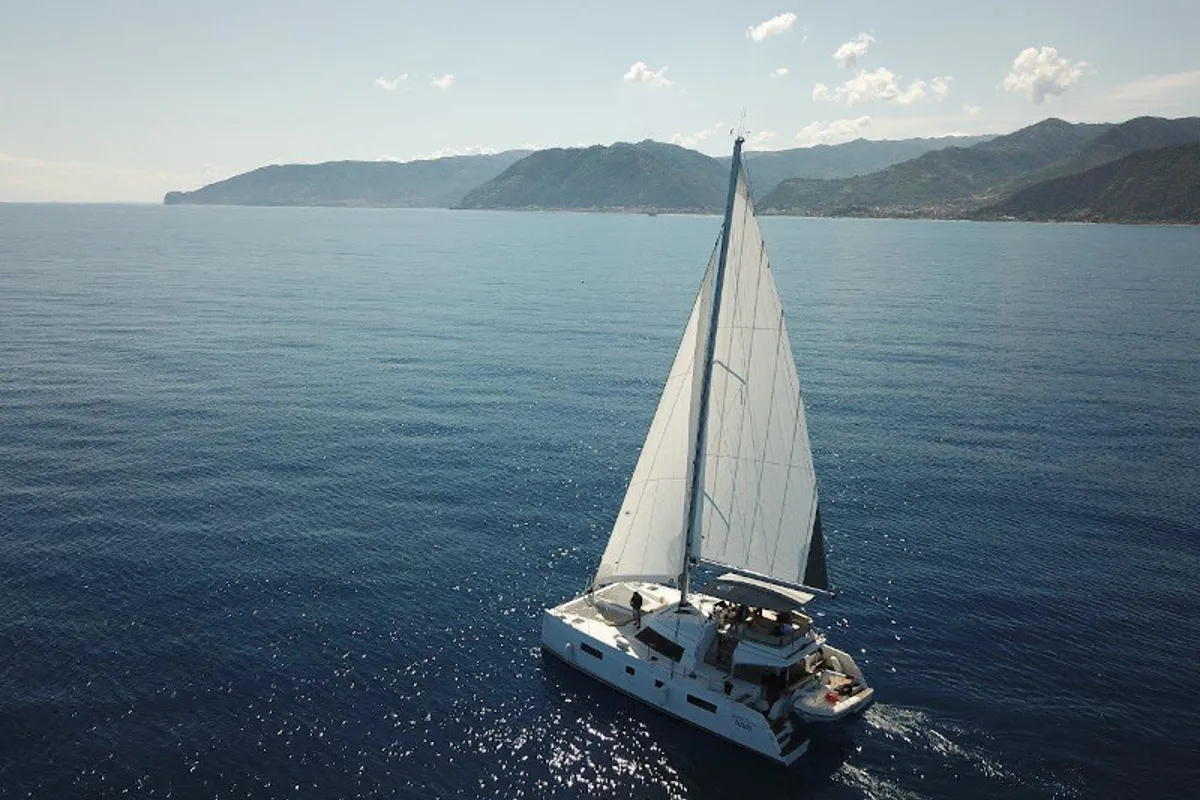 Exterior view of Elettra, a Nautitech 46 Fly catamaran at Capo d'Orlando, Italy