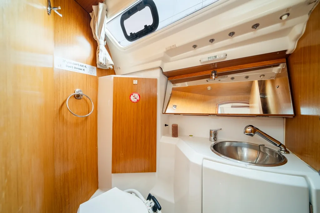 Head on Dione, a Jeanneau Sun Odyssey 36i sailboat at Lavreotiki Municipal Unit, Greece