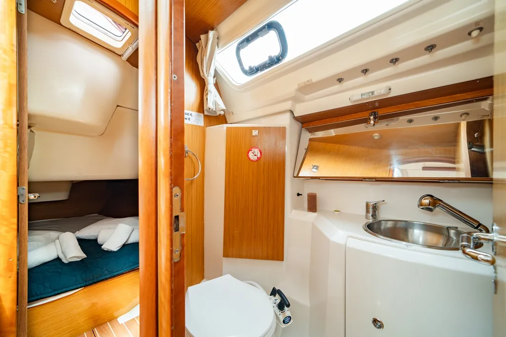 Head on Dione, a Jeanneau Sun Odyssey 36i sailboat at Lavreotiki Municipal Unit, Greece