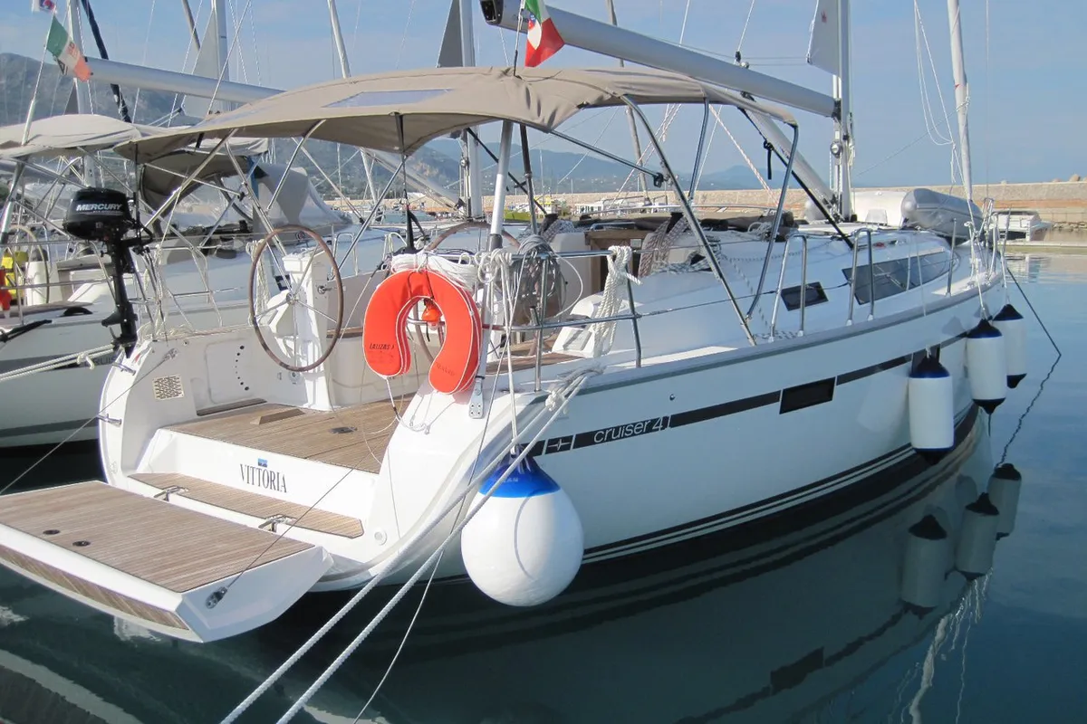 Exterior view of Vittoria, a Bavaria Cruiser 41 sailboat at Capo d'Orlando, Italy