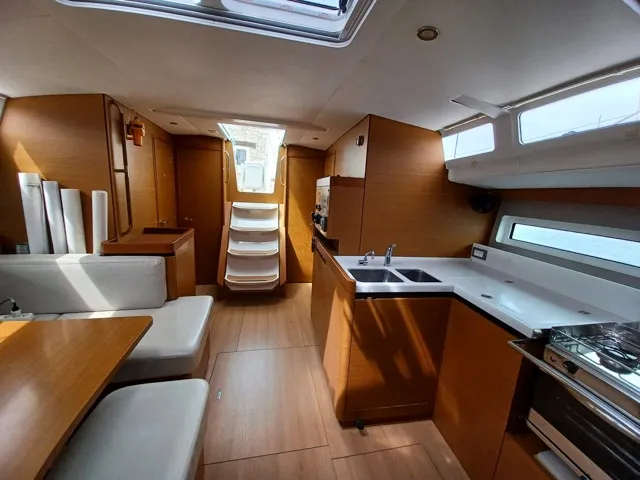 Salon of Cloe I, a Jeanneau Sun Odyssey 490 sailboat at Olbia, Italy