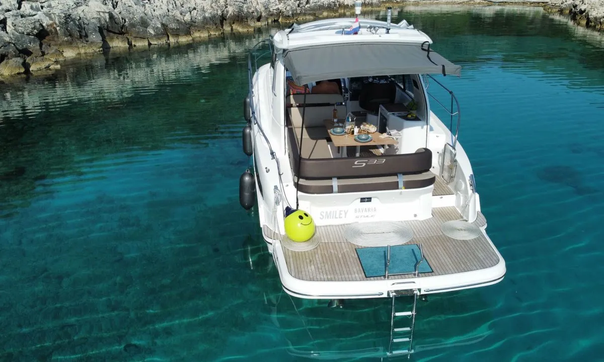 Smiley, a Bavaria 33 Sport HT motorboat at Punat, Croatia