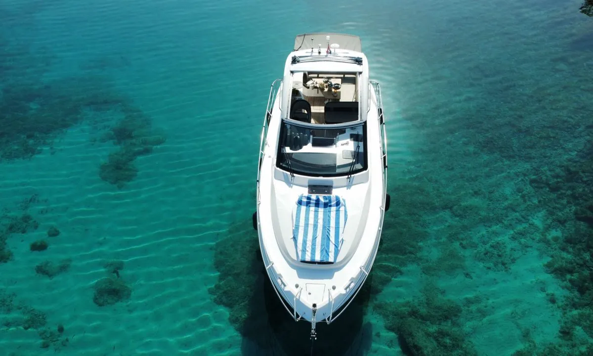 Smiley, a Bavaria 33 Sport HT motorboat at Punat, Croatia