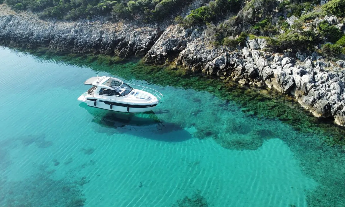 Smiley, a Bavaria 33 Sport HT motorboat at Punat, Croatia