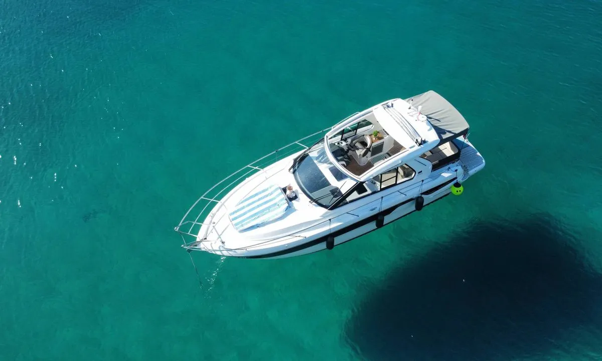 Smiley, a Bavaria 33 Sport HT motorboat at Punat, Croatia