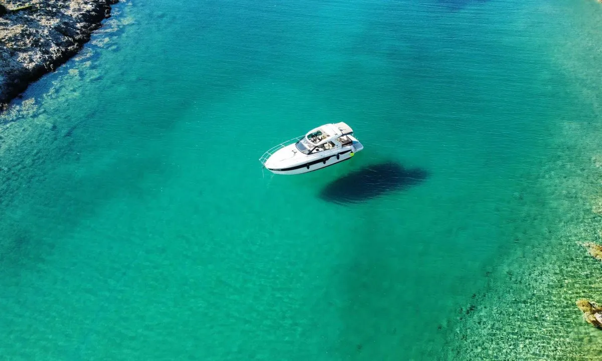 Smiley, a Bavaria 33 Sport HT motorboat at Punat, Croatia