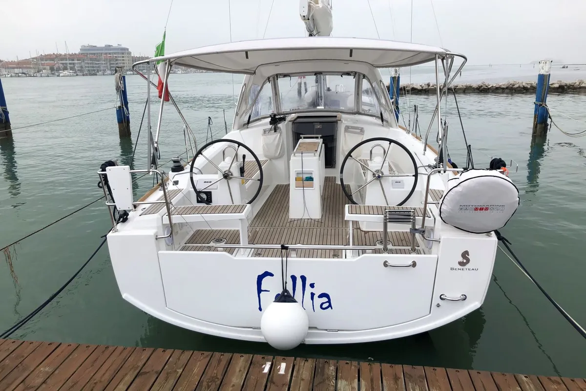Exterior view of Follia, a Beneteau Oceanis 38 sailboat at Olbia, Italy