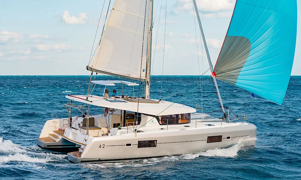 Exterior view of Sunshine, a Lagoon 42 catamaran at Palma de Mallorca, Spain
