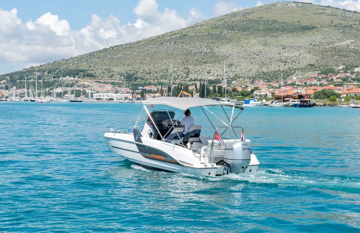 Exterior view of Benetau Flyer 6.6 Space Deck, a Beneteau Flyer 6.6 SpaceDeck motorboat at Grad Trogir, Croatia