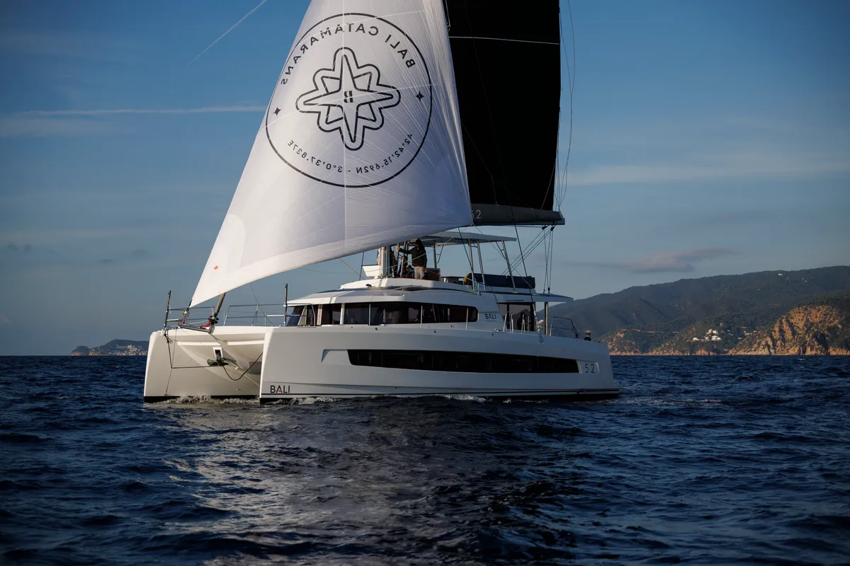 Exterior view of DISFRUTONA, a Bali 5.2 catamaran at Port d'Andratx, Spain