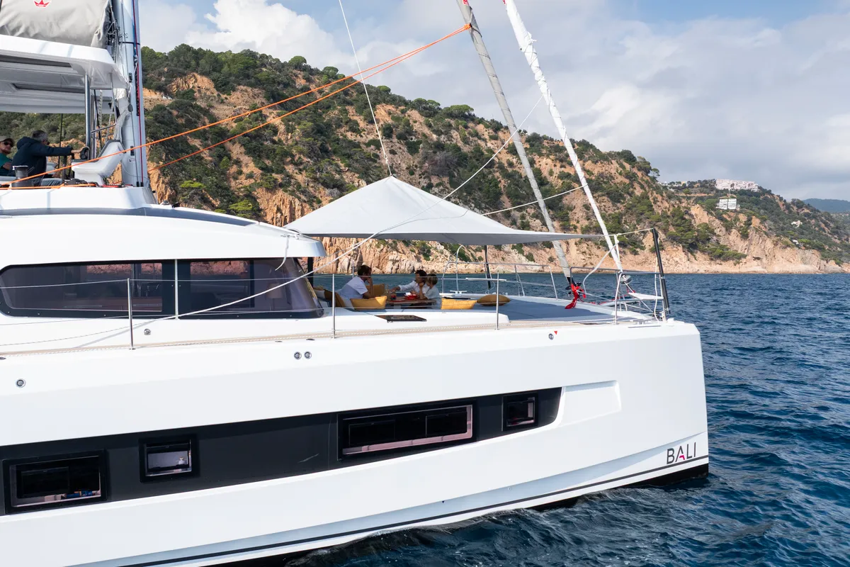 Exterior view of DISFRUTONA, a Bali 5.2 catamaran at Port d'Andratx, Spain
