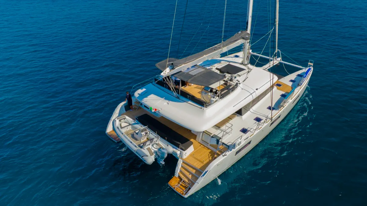 Exterior view of The Sun, a Lagoon 620 catamaran at Olbia, Italy