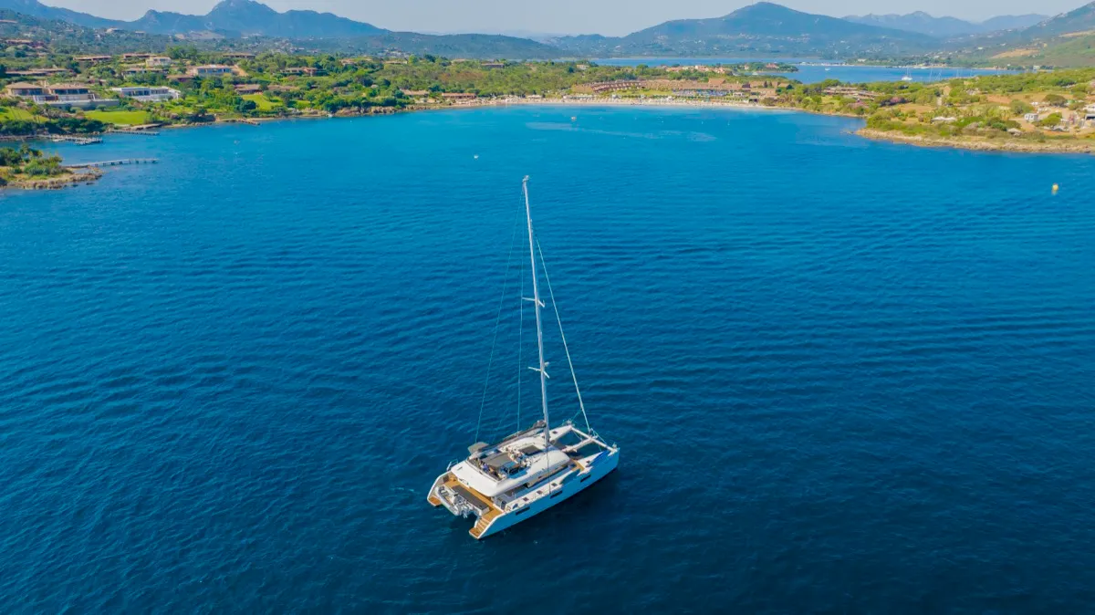 Exterior view of The Sun, a Lagoon 620 catamaran at Olbia, Italy