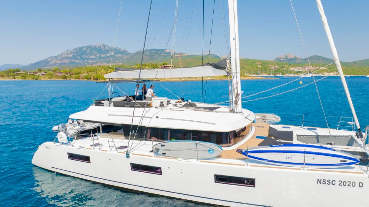 Exterior view of The Sun, a Lagoon 620 catamaran at Olbia, Italy