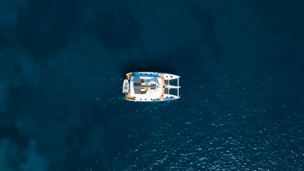 Exterior view of The Sun, a Lagoon 620 catamaran at Olbia, Italy