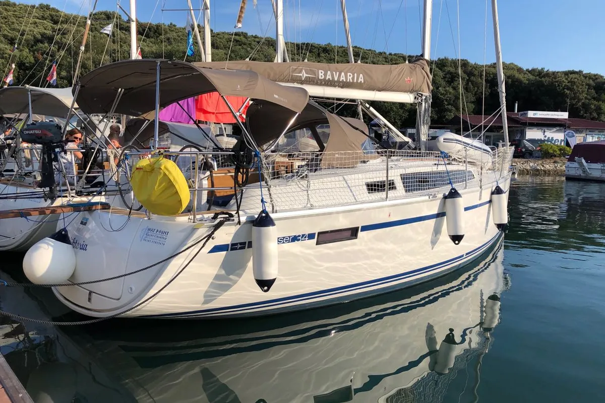 Exterior view of Viktoria, a Bavaria Cruiser 34 sailboat at Grad Pula, Croatia
