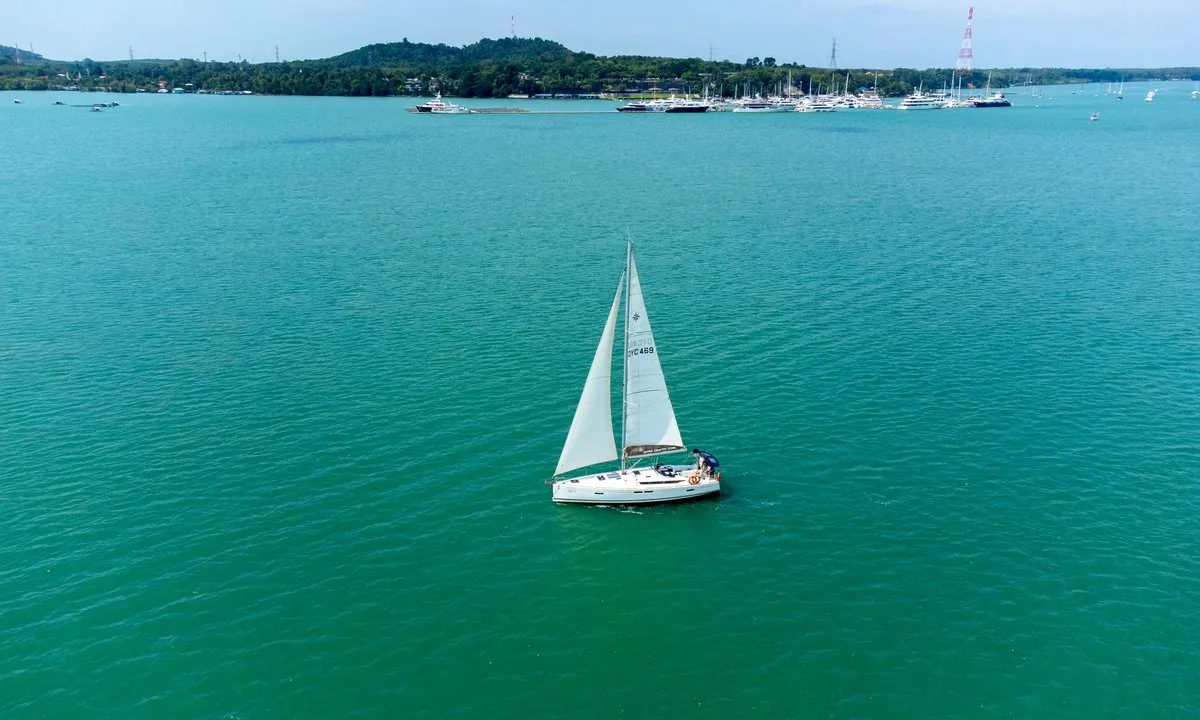 Exterior view of Aurora Belle, a Jeanneau Sun Odyssey 469 sailboat at Mai Khao, Thailand