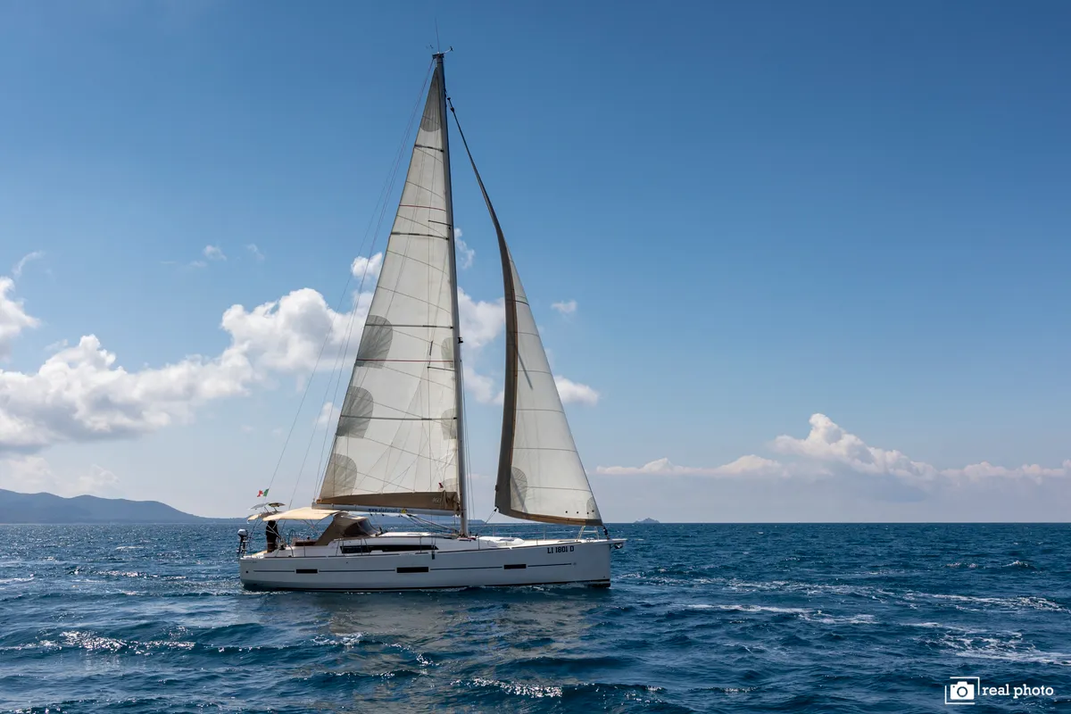 Exterior view of Asia - Solar Panel, a Dufour 460 Grand Large sailboat at Puntone di Scarlino, Italy
