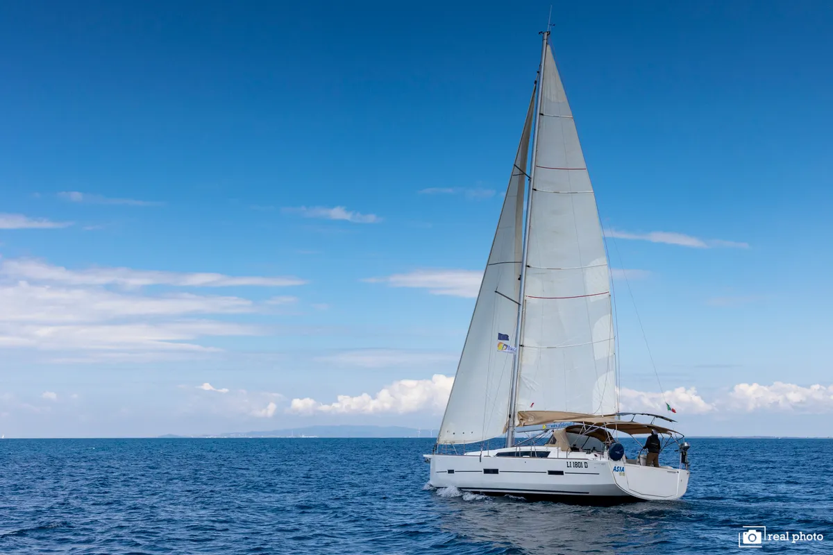 Exterior view of Asia - Solar Panel, a Dufour 460 Grand Large sailboat at Puntone di Scarlino, Italy