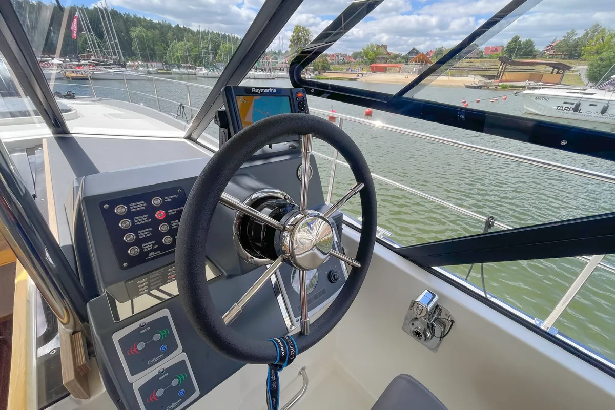 Cockpit of Nautika 1300 Royal, a Delphia Yachts Nautika 1300 motorboat at Wilkasy, Poland