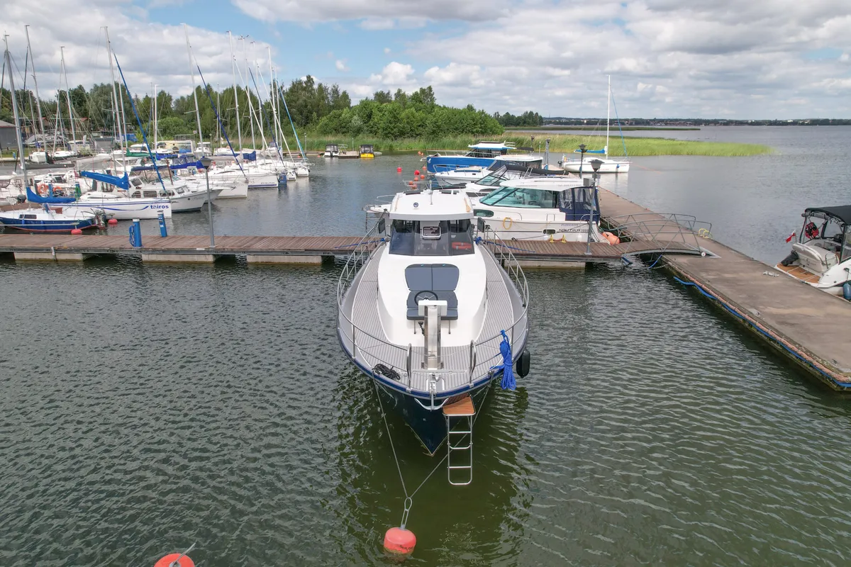 Exterior view of Nautika 1300 Royal, a Delphia Yachts Nautika 1300 motorboat at Wilkasy, Poland