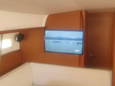 Salon of In A Silent Way, a Jeanneau Sun Odyssey 519 sailboat at Tropea, Italy