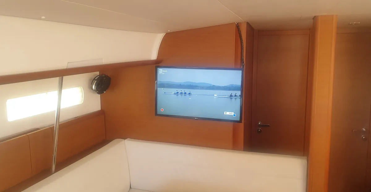 Salon of In A Silent Way, a Jeanneau Sun Odyssey 519 sailboat at Tropea, Italy
