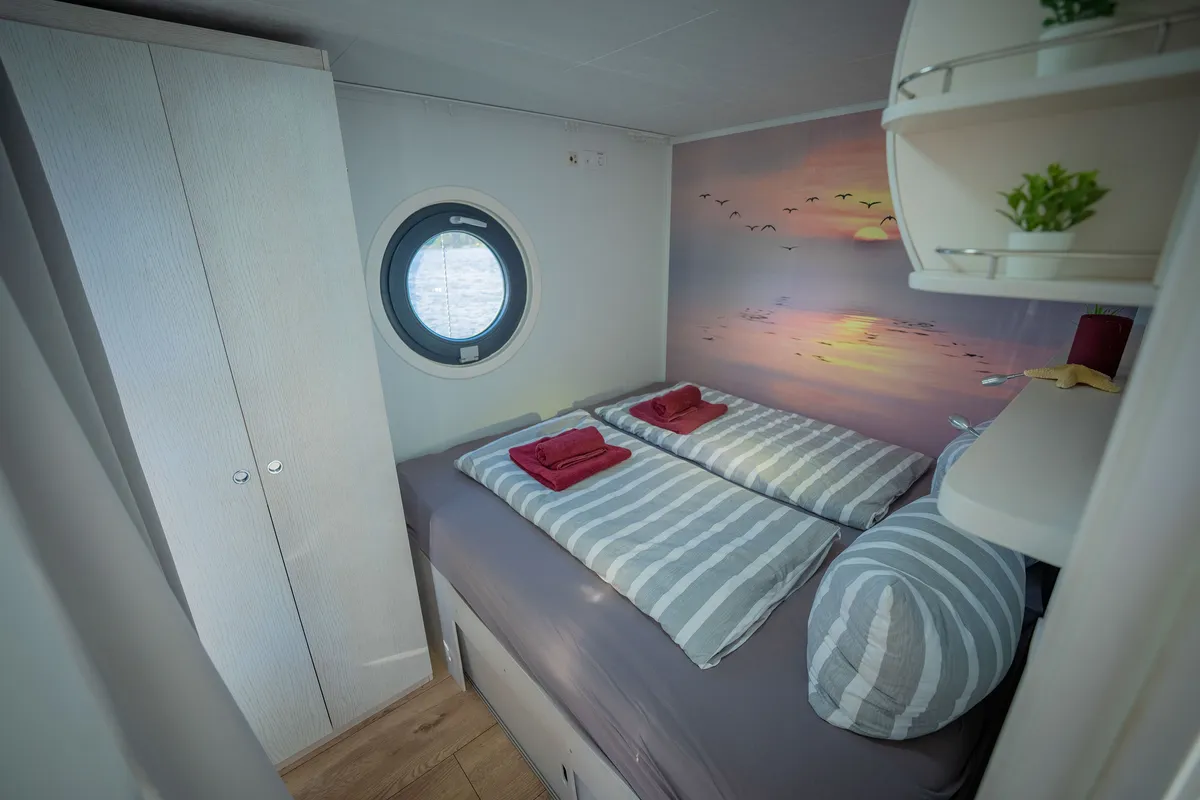 Cabin on Roma, a Woma D13 motorboat at Fürstenberg/Havel, Germany