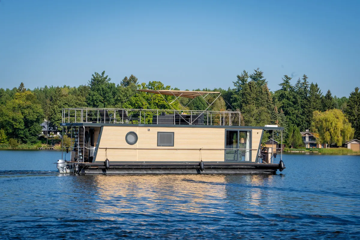 Exterior view of Roma, a Woma D13 motorboat at Fürstenberg/Havel, Germany
