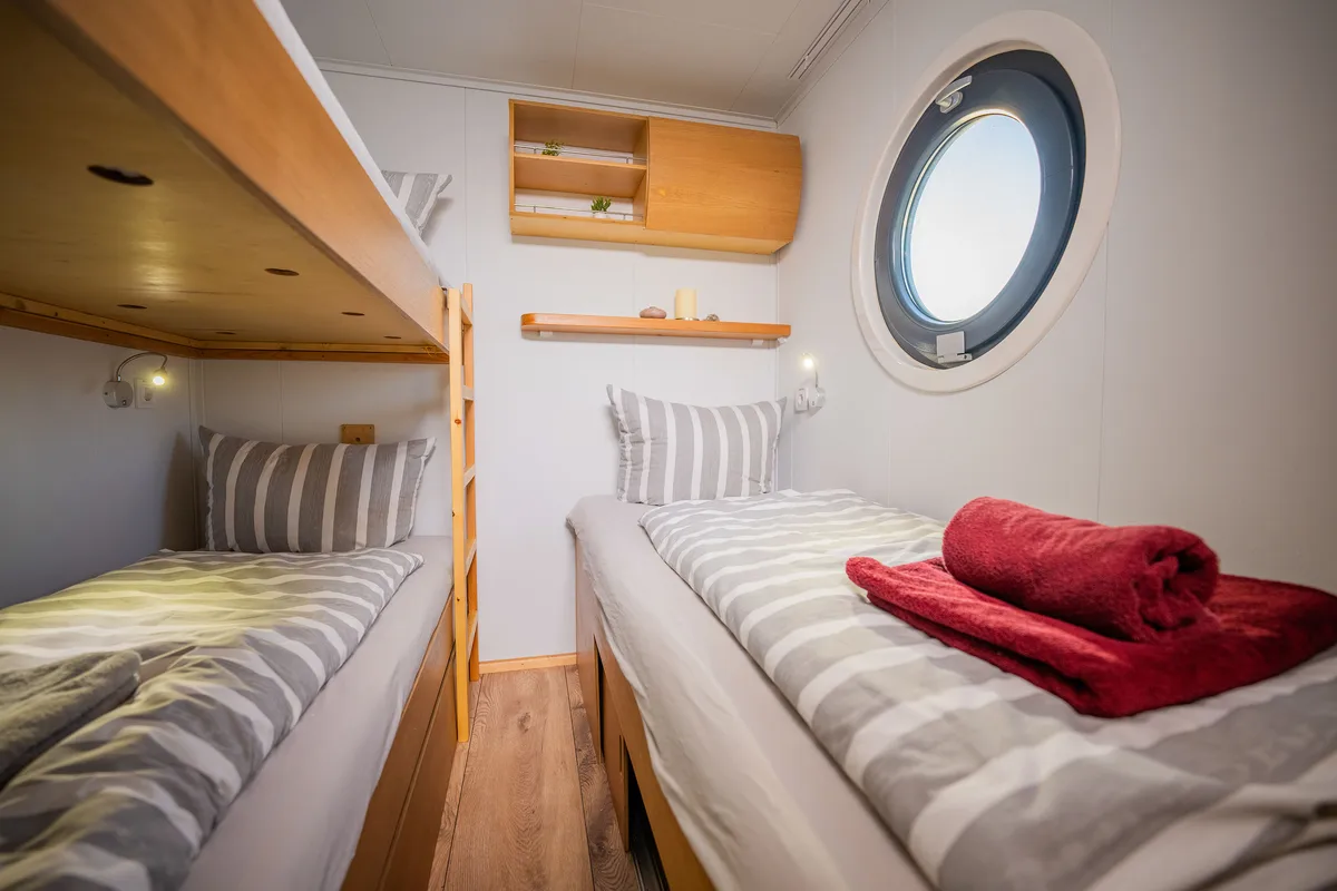 Cabin on Roma, a Woma D13 motorboat at Fürstenberg/Havel, Germany